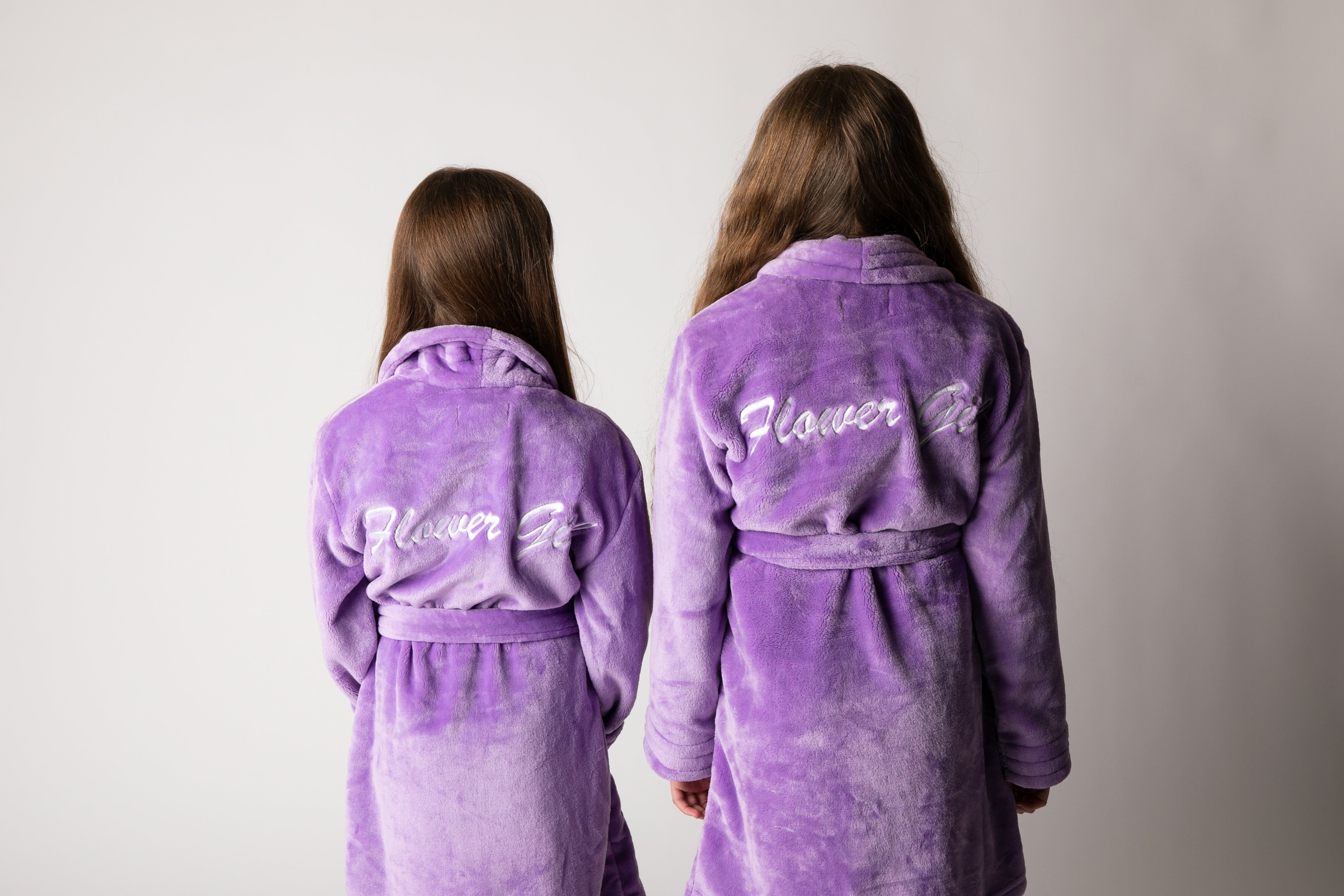 Lilac flower girls robes with white embroidery