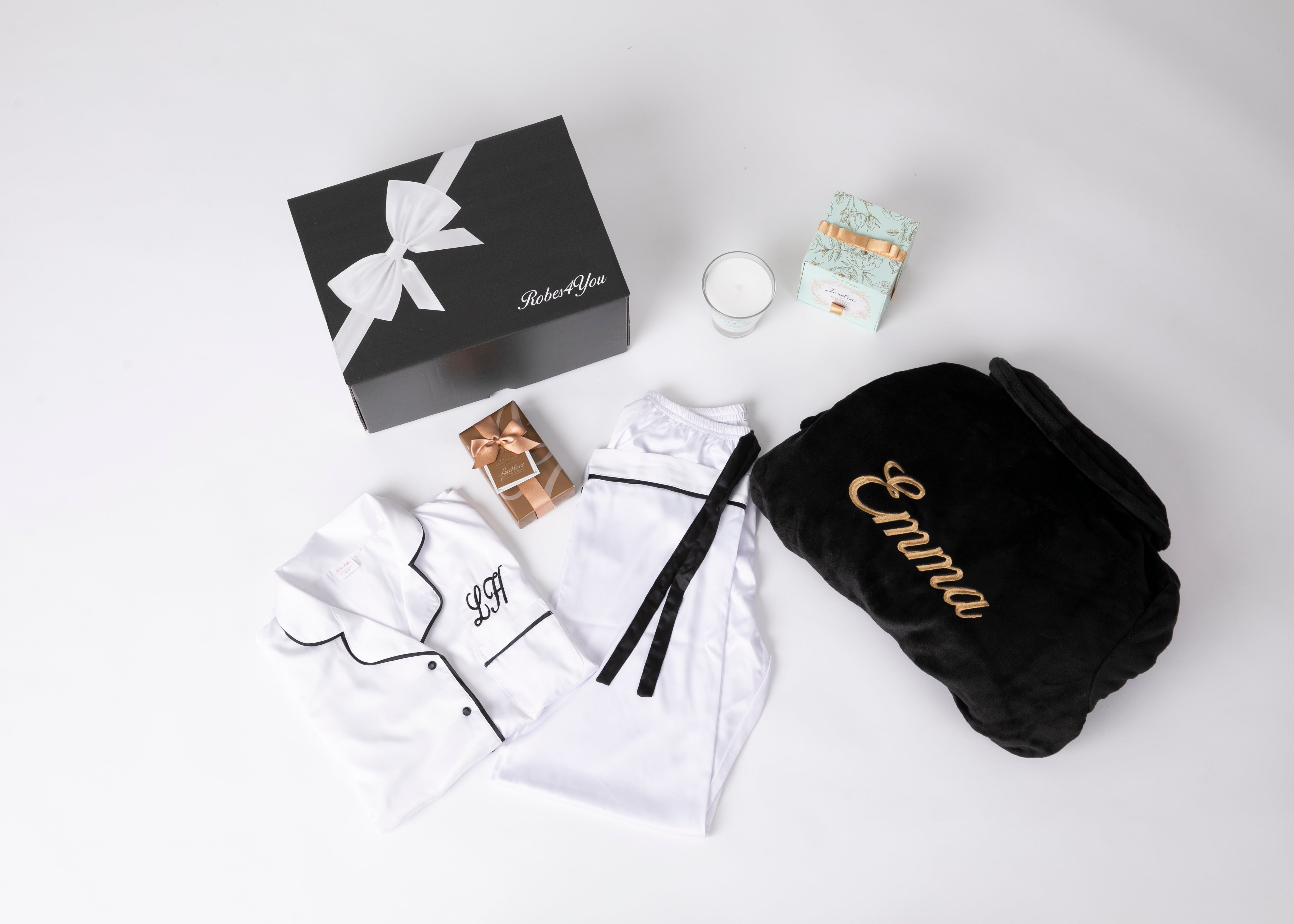 Luxurious Soft Fluffy Robe and Long Satin pyjamas with candle and chocolates presented in a gift box