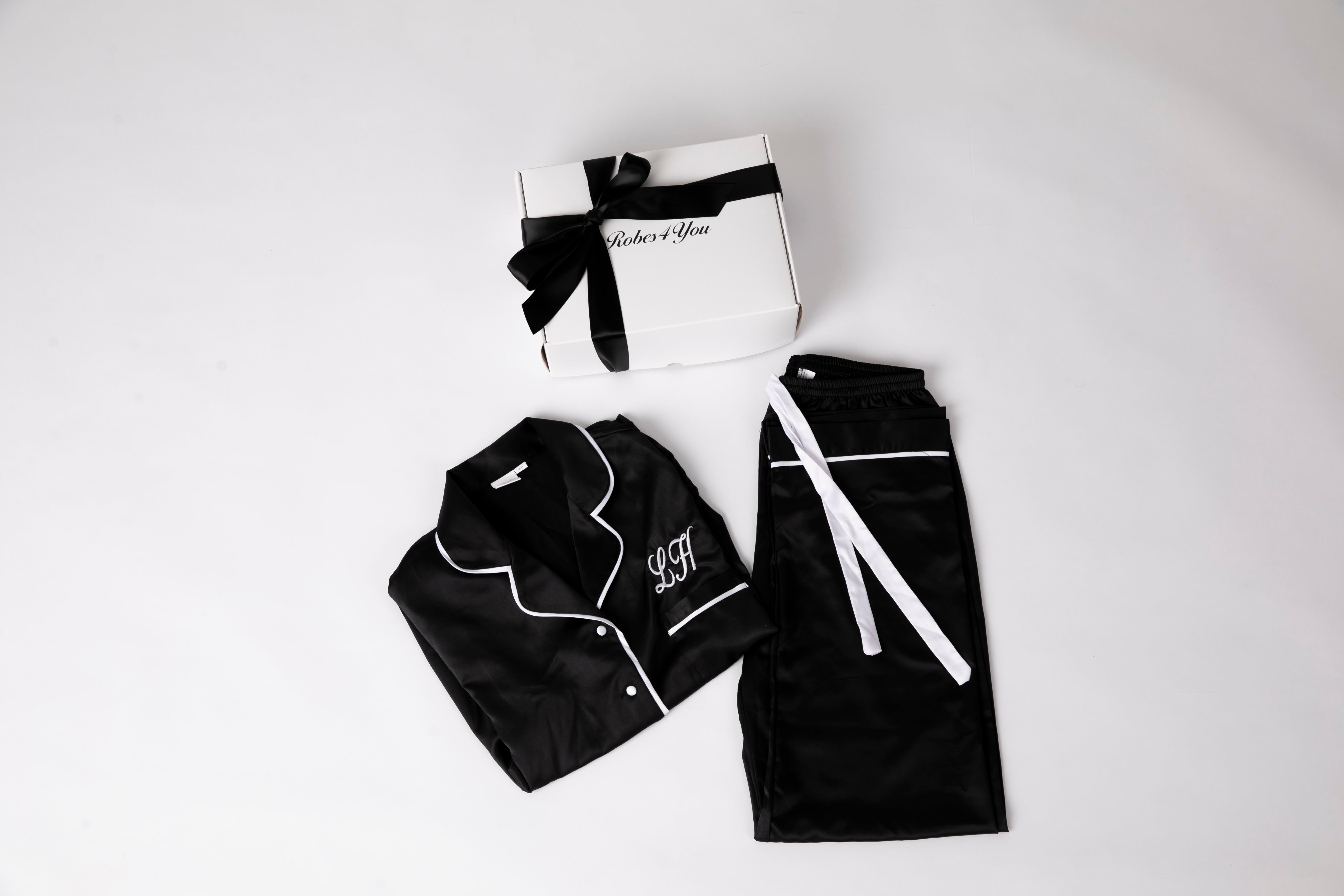 Personalised Black Satin Pjs with white Piping presented in a gift box with bow