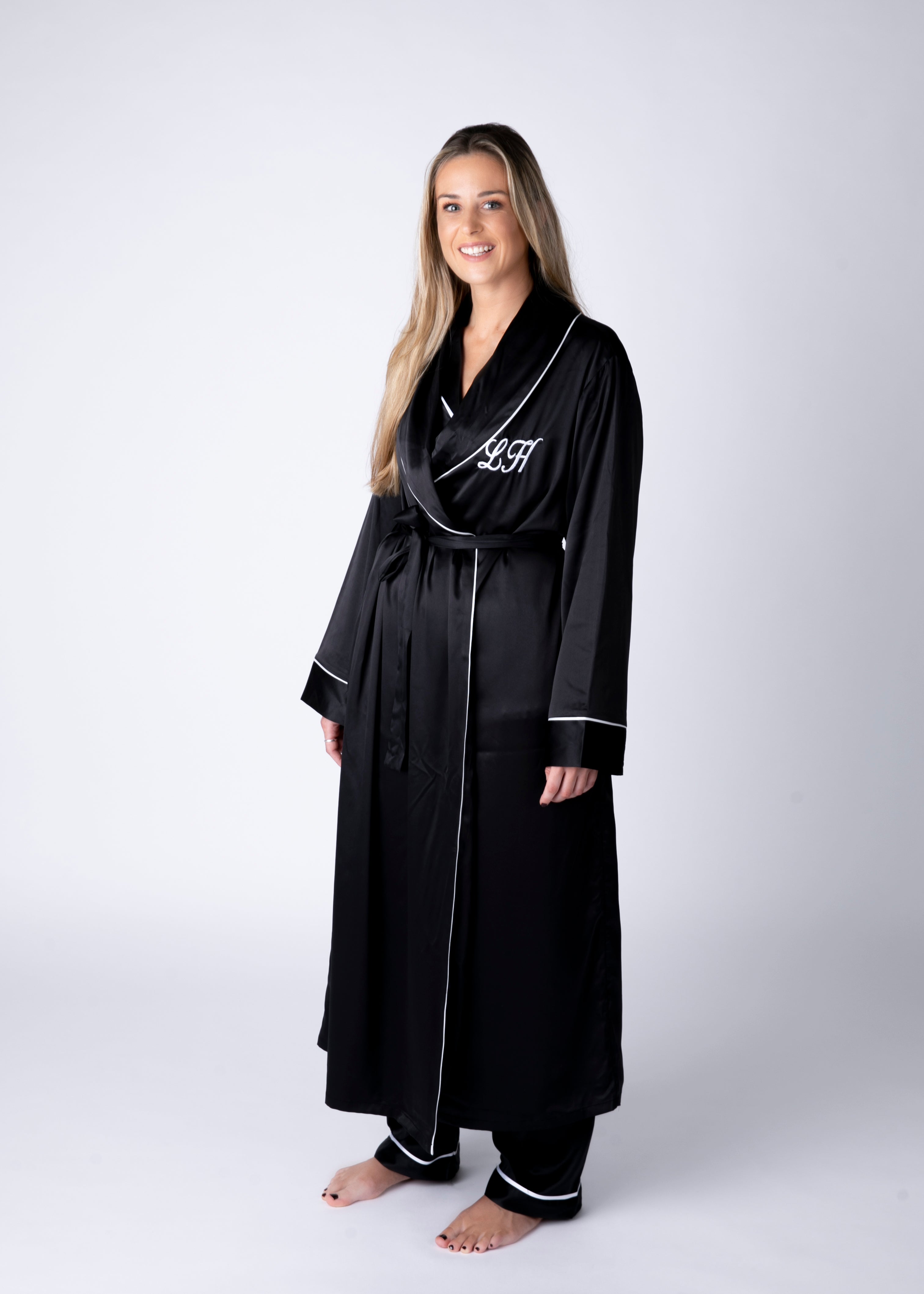 Hamper-Long Black Silky robe with matching Pyjamas with white Piping presented in a gift box with bow